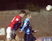 23 December 2001; Robert Martin of UCD in action against Kevin Doherty of Shelbourne during the eircom League Premier Division match between UCD and Shelbourne at Belfield Park in Dublin. Photo by  Aoife Rice/Sportsfile