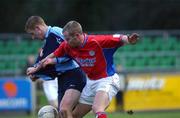 23 December 2001; Daragh Ryan of UCD is tackled by Jim Crawford of Shelbourne during the eircom League Premier Division match between UCD and Shelbourne at Belfield Park in Dublin. Photo by  Aoife Rice/Sportsfile