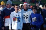 25 December 2001; Former World 5,000 meters Champion Eamonn Coghlan pictured with his sons Eamonn, Michael and John during a Christmas Day Goal Miles Run at Belfield Park in Dublin. Photo by Ray McManus/Sportsfile