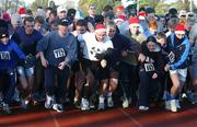 25 December 2001; Former World 5,000 meters Champion Eamonn Coghlan, centre, and competitors during a Christmas Day Goal Miles Run at Belfield Park in Dublin. Photo by Ray McManus/Sportsfile