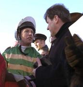 29 December 2001; Jockey Charlie speaks to owner J.P McManus after sending out Istabraq to win the Tote December Festival Hurdle on Day Four of the Leopardstown Christmas Festival at Leopardstown Racecourse in Dublin. Photo by Brendan Moran/Sportsfile