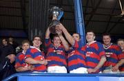 29 December 2001; Clontarf captain Donal Sheehan lifts the cup with team-mates following the Leinster Senior Cup Final match between Clontarf and County Carlow at Donnybrook Stadium in Dublin. Photo by Matt Browne/Sportsfile