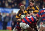 29 December 2001; Russell Armstrong of County Carlow is tackled by Paul Burns of Clontarf during the Leinster Senior Cup Final match between Clontarf and County Carlow at Donnybrook Stadium in Dublin. Photo by Matt Browne/Sportsfile