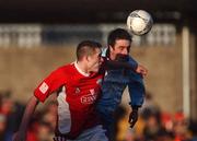 30 December 2001; Darren Kelly of Derry City in action against Noel Hartigan of Cork City during the eircom League Premier Division match between Cork City and Derry City at Turners Cross in Dublin. Photo by David Maher/Sportsfile