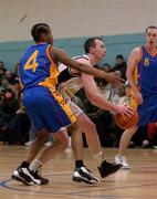 30 December 2001; Damien Sealy of Killester in action against Corey Dickerson of St Vincent's during the ESB Men's Superleague Basketball match between St Vincent's and Dart Killester at St Vincent's Basketball Club in Dublin. Photo by Brendan Moran/Sportsfile