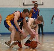 30 December 2001; Jonathan Grennell of Killester in action against David Donnelly of St Vincent's during the ESB Men's Superleague Basketball match between St Vincent's and Dart Killester at St Vincent's Basketball Club in Dublin. Photo by Brendan Moran/Sportsfile