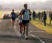 1 January 2002; Mark Kenneally of Raheny AC, on his way to winning the Oman Cup in the Phoenix Park in Dublin. Photo by Brendan Moran/Sportsfile