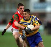 23 December 2001; Jason Sherlock of Na Fianna in action against Damian Power of Rathnew during the AIB Leinster Senior Club Football Championship Final Replay match between Rathnew and Na Fianna at St Conleth's Park in Newbridge, Kildare. Photo by Damien Eagers/Sportsfile