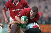 5 January 2002; Marcus Horan of Munster is tackled by Tony Diprose of Harlequins during the Heineken Cup Pool 4 Round 5 match between Munster and Harlequins at Thomond Park in Limerick. Photo by Matt Browne/Sportsfile