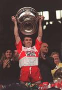 19 September 1993; Derry captain Henry Downey lifts the Sam Maguire Cup following the All-Ireland Senior Football Championship Final match between Derry and Cork at Croke Park in Dublin. Photo by David Maher/Sportsfile