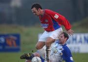 6 January 2002; John Burns of Shelbourne in action against Trevor Vaughan of Monaghan United during the eircom League Premier Division match between Monaghan United and Shelbourne at Century Homes Park in Monaghan. Photo by David Maher/Sportsfile