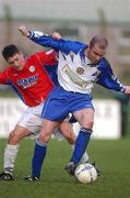 6 January 2002; Wesley Houlihan of Shelbourne in action against Declan McDonnell of Monaghan United during the eircom League Premier Division match between Monaghan United and Shelbourne at Century Homes Park in Monaghan. Photo by David Maher/Sportsfile
