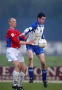 6 January 2002; Tony McCarthy of Shelbourne in action against Darren McKenna of Monaghan United during the eircom League Premier Division match between Monaghan United and Shelbourne at Century Homes Park in Monaghan. Photo by David Maher/Sportsfile