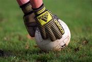 6 January 2002; A footballer places the ball during the 2002 Football Blue Stars Exibition Game between Blue Stars and Dublin at Thomas Davis GAA Club in Tallaght, Dublin. Photo by Ray McManus/Sportsfile