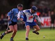 6 January 2002; Conal Keaney of  Blue Stars in action against Stephen Perkins of Dublin during the 2002 Hurling Blue Stars Exibition Game between Blue Stars and Dublin at Thomas Davis GAA Club in Tallaght, Dublin. Photo by Ray McManus/Sportsfile