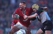 5 January 2002; Mick O'Driscoll of Munster is tackled by Roy Winters of Harlequins during the Heineken Cup Pool 4 Round 5 match between Munster and Harlequins at Thomond Park in Limerick. Photo by Matt Browne/Sportsfile