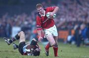 5 January 2002; Anthony Horgan of Munster in action against Dan Luger of Harlequins during the Heineken Cup Pool 4 Round 5 match between Munster and Harlequins at Thomond Park in Limerick. Photo by Matt Browne/Sportsfile
