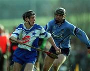 6 January 2002; Ger Ennis of Blue Stars in action against Aodhan de Paor of Dublin during the 2002 Hurling Blue Stars Exibition Game between Blue Stars and Dublin at Thomas Davis GAA Club in Tallaght, Dublin. Photo by Ray McManus/Sportsfile