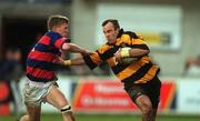 29 December 2001; Ian Dwyer of County Carlow in action against Daire Higgins of Clontarf during the Leinster Senior Cup Final match between Clontarf and County Carlow at Donnybrook Stadium in Dublin. Photo by Matt Browne/Sportsfile