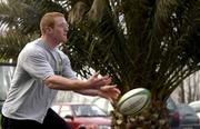 11 January 2002; Paul O'Connell passes the ball to team-mate Mike Prendergast outside the team hotel prior to a Munster training session in Toulouse, France.
