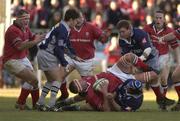 12 January 2002; Mick O'Dricsoll of Munster is tackled by Ignacio Lobbe of Castres during the Heineken Cup Pool 4 Round 6 match between Castres and Munster at Stade Pierre-Antoine in Castres, France. Photo by Brendan Moran/Sportsfile