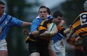 12 January 2002; Mark Buckley of Carlow is tackled by Cyril Tupiniere of Garryowen during the AIB All-Ireland League Division 1 match between Garryowen and Carlow at Dooradoyle in Limerick. Photo by Aoife Rice/Sportsfile