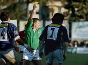 12 January 2002; Romain Froment of Castres, right, is shown a yellow card by referee Tony Spreadbury during the Heineken Cup Pool 4 Round 6 match between Castres and Munster at Stade Pierre-Antoine in Castres, France. Photo by Brendan Moran/Sportsfile