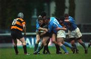 12 January 2002; Russell Armstrong of Carlow is tackled by Cian Foley of Garryowen, 12,  and team-mate John Langford during the AIB All-Ireland League Division 1 match between Garryowen and Carlow at Dooradoyle in Limerick. Photo by Aoife Rice/Sportsfile