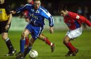12 January 2002; Tom Mohan of Finn Harps in action against Pat Fenlon of Shelbourne during the FAI Carlsberg Cup Third Round match between Finn Harps and Shelbourne at Finn Park in Ballybofey, Donegal. Photo by David Maher/Sportsfile