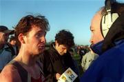 13 January 2002; Matt O'Dowd of England, is interviewed after winning the Men's race during the 2002 Ras na hEireann at Dunleer Athletics Club in Louth. Photo by Pat Murphy/Sportsfile