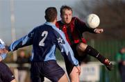 13 January 2002; John Luby of Cherry Orchard in action against David Quinn of UCD during the FAI Carlsberg Cup Third Round match between Cherry Orchard and UCD at Capco Park in Dublin. Photo by David Maher/Sportsfile