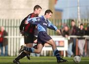 13 January 2002; John Martin of UCD in action against Kevin Harrington of Cherry Orchard during the FAI Carlsberg Cup Third Round match between Cherry Orchard and UCD at Capco Park in Dublin. Photo by David Maher/Sportsfile
