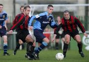 13 January 2002; Robert Martin of UCD in action against James Smith, left, and Colm Byrne of Cherry Orchard during the FAI Carlsberg Cup Third Round match between Cherry Orchard and UCD at Capco Park in Dublin. Photo by David Maher/Sportsfile