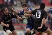 13 January 2002; Adam Magro of Leinster is tackled by Cedric Debrosse right, and Cedirc Heymans of Tolouse during the Heineken Cup Pool 6 Round 6 match between Toulouse and Leinster at the Stade Les Sept Denier in Toulouse, France. Photo by Brendan Moran/Sportsfile