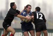 13 January 2002; Keith Gleeson of Leinster is tackled by Cedric Debrosse, left, and Xavier Garbajosa of Toulouse during the Heineken Cup Pool 6 Round 6 match between Toulouse and Leinster at the Stade Les Sept Denier in Toulouse, France. Photo by Brendan Moran/Sportsfile