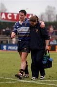 13 January 2002;  Brian O'Meara of Leinster is helped from the pitch by team physio Frances Moran after receiving ligament damage to his knee during the Heineken Cup Pool 6 Round 6 match between Toulouse and Leinster at the Stade Les Sept Denier in Toulouse, France. Photo by Matt Browne/Sportsfile