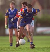 13 January 2002; Shane O'Neill of Wicklow in action against Simon Gerard of Louth during the O'Byrne Cup Semi-Final match between Louth and Wicklow at O'Raghallaighs GAA Club in Drogheda, Louth. Photo by Ray McManus/Sportsfile