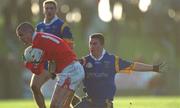 13 January 2002; Keith Lynch of Louth in action against Colm Tooney of Wicklow during the O'Byrne Cup Semi-Final match between Louth and Wicklow at O'Raghallaighs GAA Club in Drogheda, Louth. Photo by Ray McManus/Sportsfile