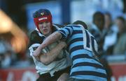 15 January 2002; Mark Neylon of Newbridge College is tackled by Brian Collins of Castleknock College during the Schools Rugby Junior League Final match between Castleknock College and Newbridge College at Donnybrook Stadium in Dublin. Photo by Aoife Rice/Sportsfile