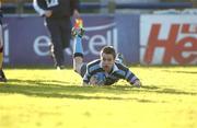 15 January 2002; Karl Coombes of Castleknock College scores a try for his side during the Schools Rugby Junior League Final match between Castleknock College and Newbridge College at Donnybrook Stadium in Dublin. Photo by Aoife Rice/Sportsfile