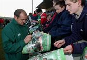 15 January 2002; Peter Clohessy signs autographs for schoolkids during a Ireland Rugby squad training session and press conference at Thomond Park in Limerick. Photo by Matt Browne/Sportsfile