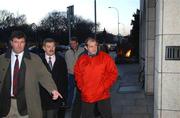17 January 2002; Peter Chohessy, accompanied by Munster team Manager Gerry Holland, Solicitor Olan Kelleher and Team Captain Mick Galwey, make their way to a ERC Hearing at Huguenot House in Dublin. Photo by Matt Browne/Sportsfile