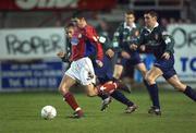 18 January 2002; Davy Byrne of Shelbourne in action against Paul Marney and Darragh Maguire of St Patrick's Athletic during the eircom League Premier Division match between Shelbourne and St Patrick's Athletic at Tolka Park in Dublin. Photo by Damien Eagers/Sportsfile
