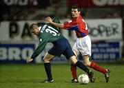 18 January 2002; Jim Crawford of Shelbourne in action against Robbie McGuinness of St Patrick's Athletic during the eircom League Premier Division match between Shelbourne and St Patrick's Athletic at Tolka Park in Dublin. Photo by David Maher/Sportsfile