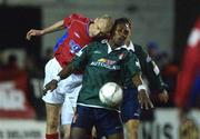18 January 2002; Tony McCarthy of Shelbourne in action against Mbabazi Livingstone of St Patrick's Athletic during the eircom League Premier Division match between Shelbourne and St Patrick's Athletic at Tolka Park in Dublin. Photo by David Maher/Sportsfile