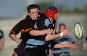 19 January 2002; David Quinlan of Shannon is tackled by Fiachra Baynes of Lansdowne during the AIB All-Ireland League Division 1 match between Shannon and Lansdowne at Thomond Park in Limerick. Photo by Damien Eagers/Sportsfile