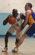 20 January 2002; James Singleton of Waterford Crystal in action against David Donnelly of St Vincent's during the ESB Men's Superleague match between St Vincent's and Waterford Crystal at St Vincent's Basketball Club in Glasnevin, Dublin. Photo by Brendan Moran/Sportsfile