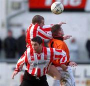 20 January 2002; Sean Hargan and Eddie McCallion of Derry City in action against Keith Maher of St Kevin's Boys during the FAI Carlsberg Cup Third Round Replay match between Derry City and St Kevin's Boys at The Brandywell in Derry. Photo by David Maher/Sportsfile