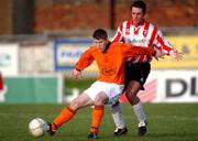 20 January 2002; Darren Kelly of Derry City in action against Keith Maher of St Kevin's Boys during the FAI Carlsberg Cup Third Round Replay match between Derry City and St Kevin's Boys at The Brandywell in Derry. Photo by David Maher/Sportsfile