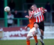 20 January 2002; Tommy McCallion of Derry City in action against Keith Maher of St Kevin's Boys during the FAI Carlsberg Cup Third Round Replay match between Derry City and St Kevin's Boys at The Brandywell in Derry. Photo by David Maher/Sportsfile